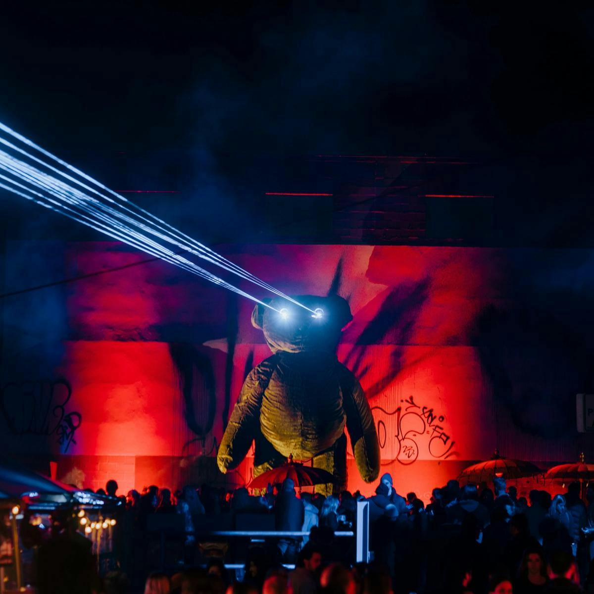 A giant teddy with laser shooting out of his eyes